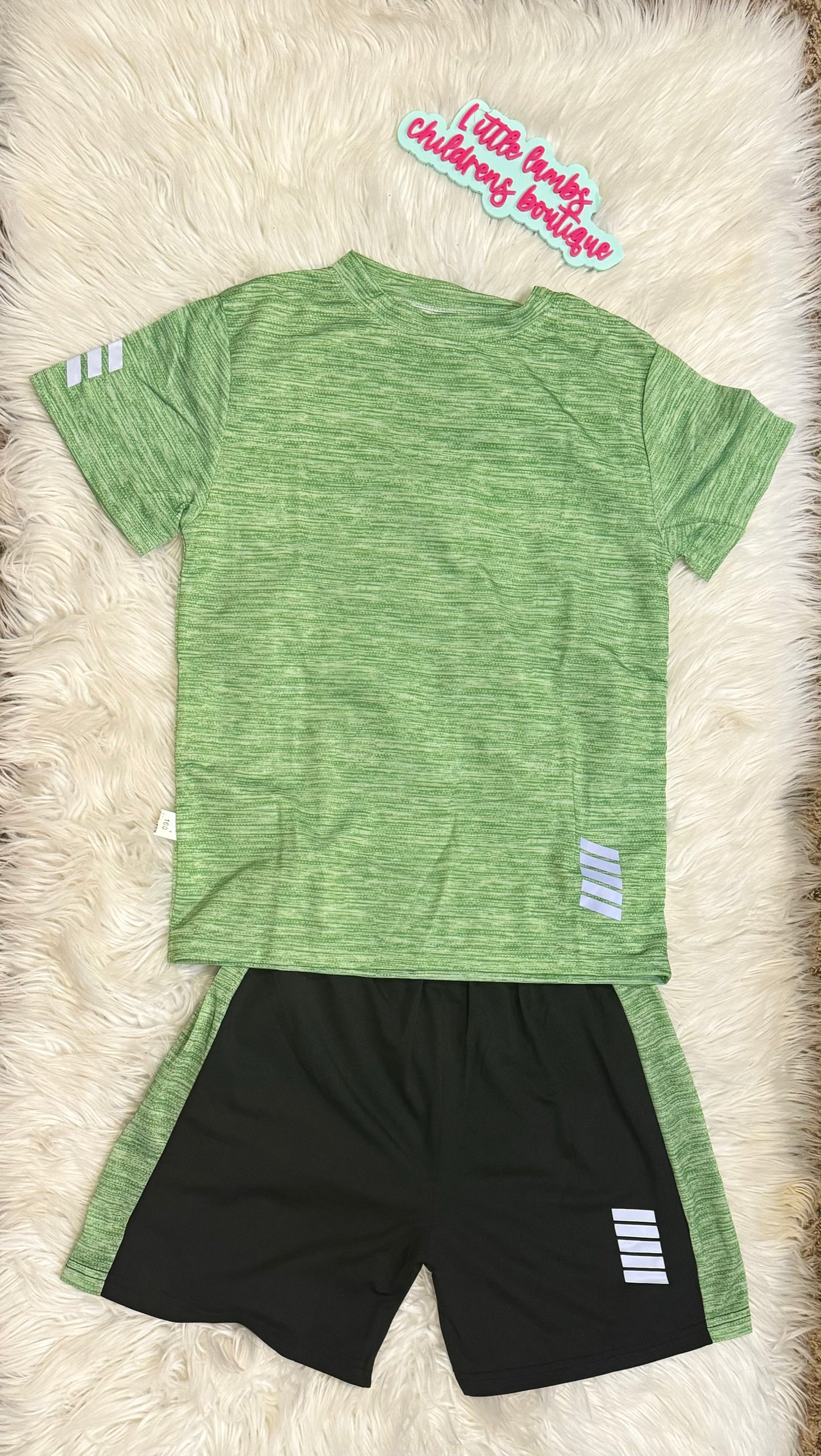 Green and light green shirt with black shorts- Gym cloth material