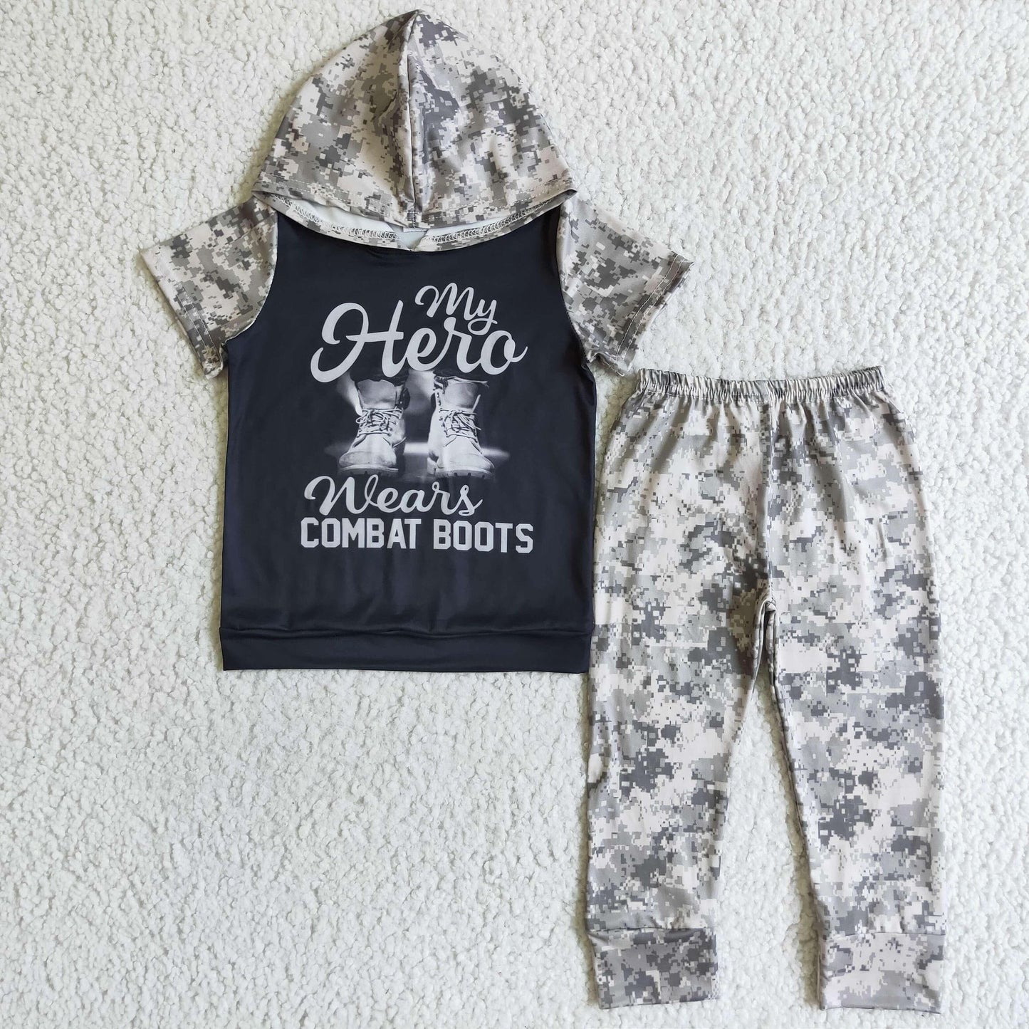 Boy hero wears combat boots
