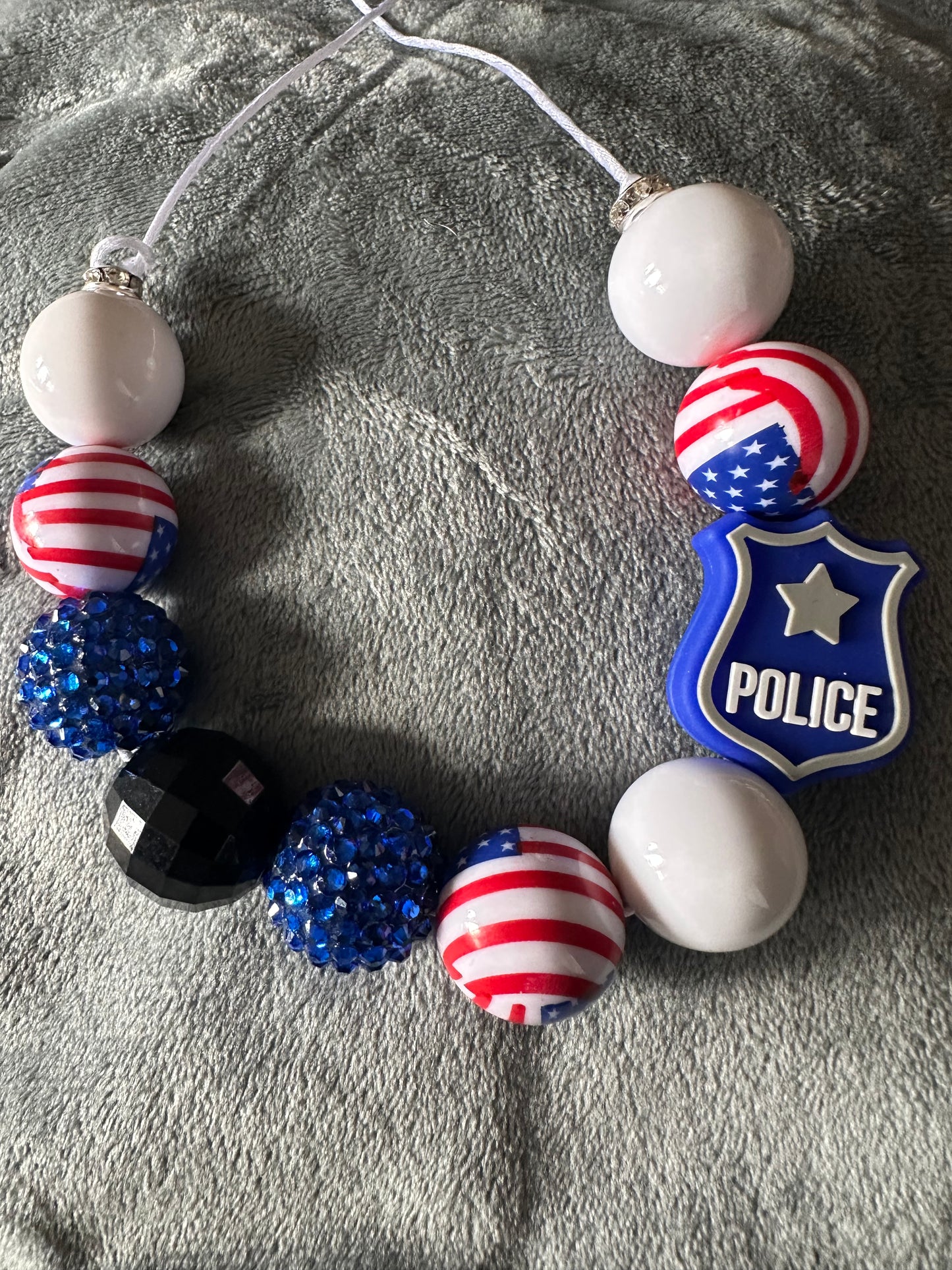 Bubble gum necklace police focal point