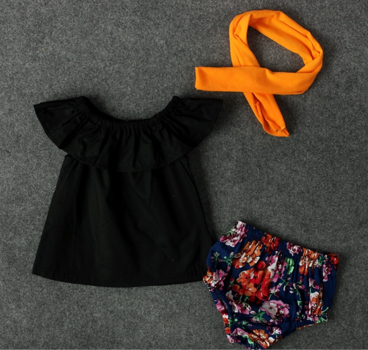 Black shirt and flower bummie with headband